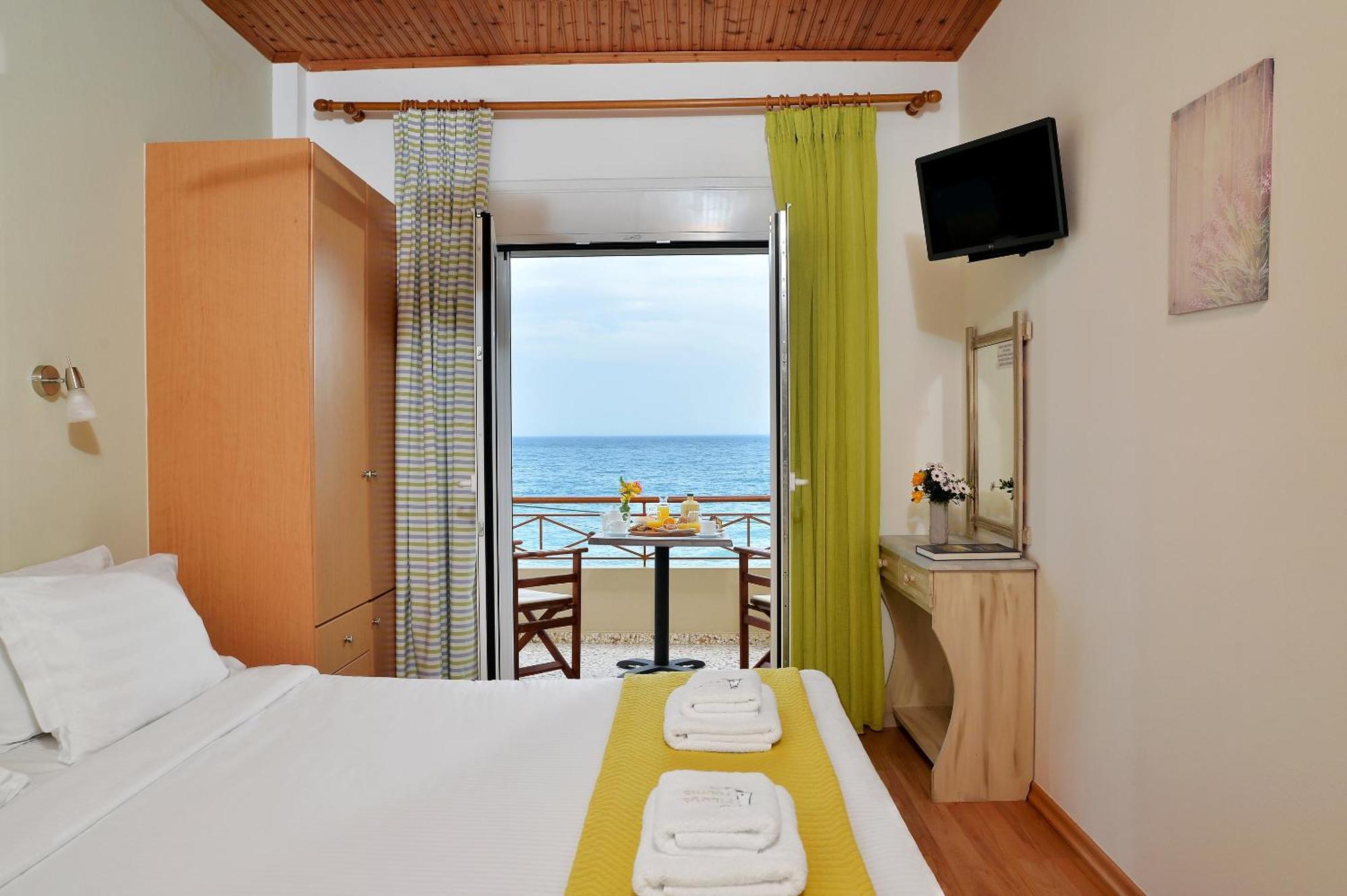 Pharos Rooms Ilia Bagian luar foto