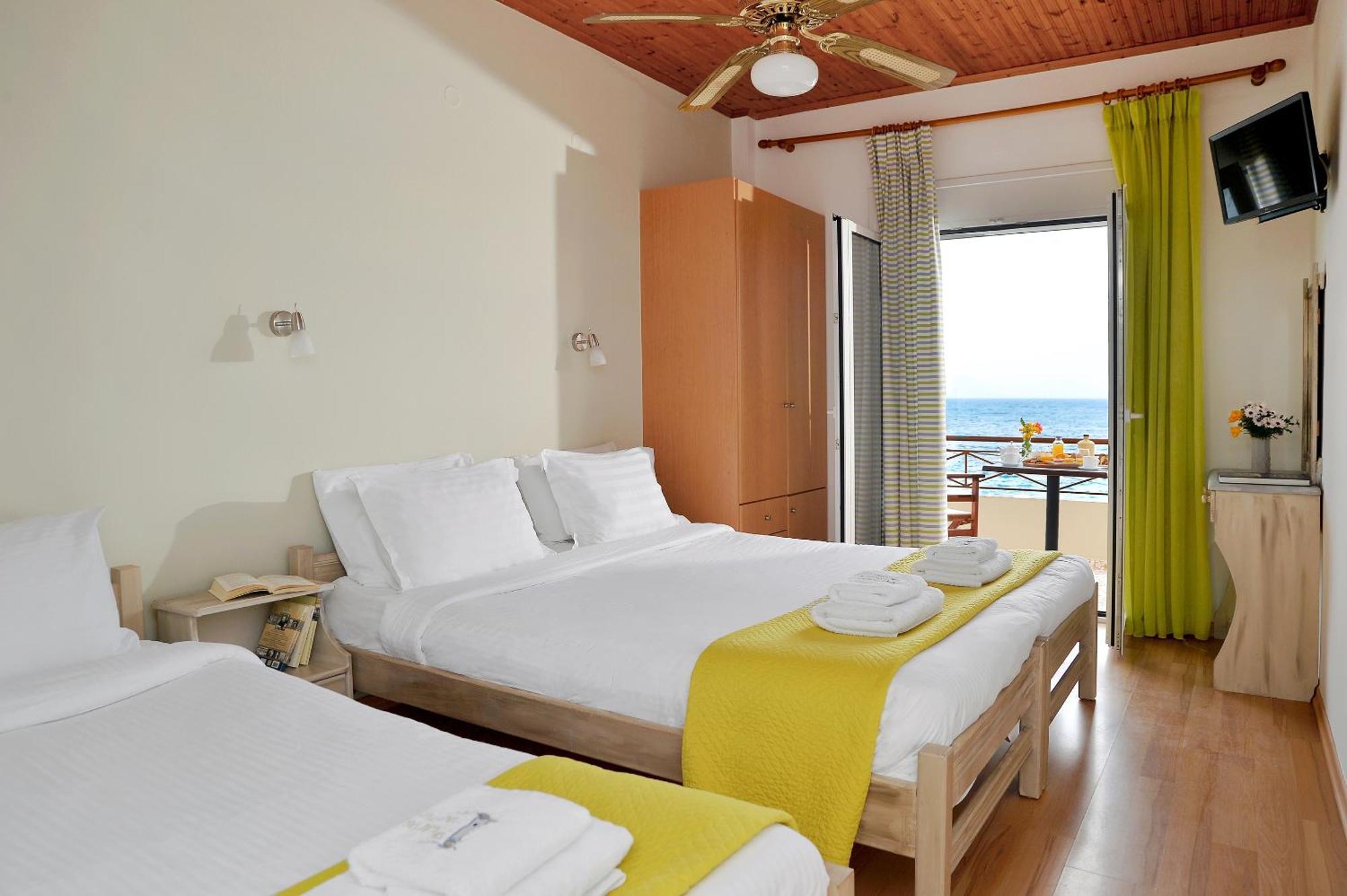Pharos Rooms Ilia Bagian luar foto